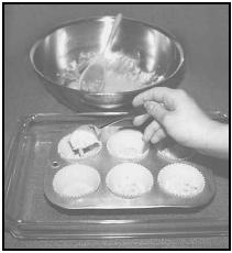 Drop the coconut-cheese mixture by spoonful into baking cups. EPD Photos