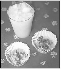 Quejadinhas (coconut-cheese snacks) and orange-pineapple drink combine to make a delicious snack anytime. EPD Photos