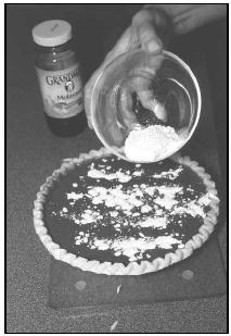 Molasses is the main ingredient in the filling for Shoofly Pie. The pie is topped with a sprinkling of reserved flour mixture. EPD Photos